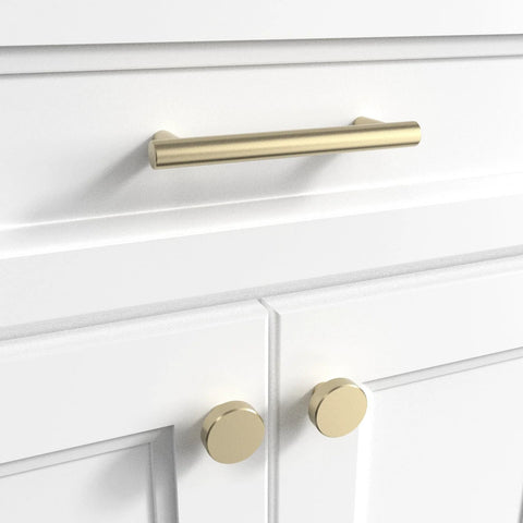 Door And Drawer Pulls 6-Inch Center-To-Center Brushed Titanium Gold Finish 10 Pack installed on white cabinet