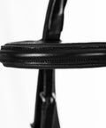 Close-up of black padded cavesson on Padded Dressage Bridle With Reins And Removable Flash In Black For Warmbloods All Day Comfort.