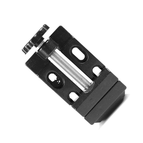 Premium Aluminum Mini Bench Vise Heavy Duty Clamping Vice With Hella Smooth Pivot And Locks Down Tight On Workbenches For Garage Repairs And Hobby Projects, top view.