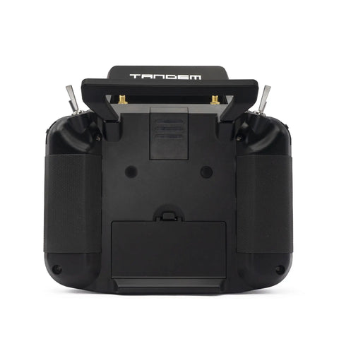 Back view of Tandem X18 Radio Transmitter Dual Band 2.4GHz And 900MHz TD System with ergonomic grips and top switches.
