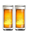 Heavy Duty Double Wall Insulated Borosilicate Glass Tumblers Set Of 2 20 Oz Highball Cups for beer with golden liquid.
