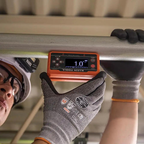 Worker uses Digital Level Angle Finder With Programmable Angles, Measures 0 To 90 And 0 To 180 Degrees, Dual Axis Bullseye Ranges