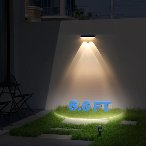 Heavy Duty Solar Wall Lights Outdoor Waterproof For Fence Or Mailbox Or Address Sign Offering Three Light Modes With Warm Daylight And Cool White Colors Using Wide Angle Focus Lens Delivering Kickass Yard Illumination illuminating grass marked 6.6 FT at night.
