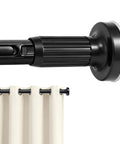 Close-up of Extra Long Tension Curtain Rod 39 To 173 Inches 3.3 To 14 Feet Outdoor No Drilling with black finish and a cream curtain