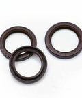 Beefy Timing Belt Kit With Water Pump And Tensioner Keeps Engine Sweet And Smooth Saving Cash On Mechanic Bills Ensuring Reliability And Peace of Mind For Your Ride Everyday On the Road Without Worrying Failures Or Costly Repairs. three brown engine seals
