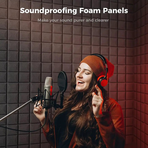 Woman singing in front of microphone with 12 Pack Noise Canceling Acoustic Foam Wall Panels High Density Sound Proof Tiles.