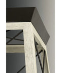 Close-up of Briarwood Collection 2-Light Flush Mount Ceiling Light with graphite finish detailing and wood accents, 12x6 inch modern fixture.