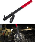 E-cowlboy camshaft pulley holding tool with red handle and black arms; installed on engine (Honda/Toyota)