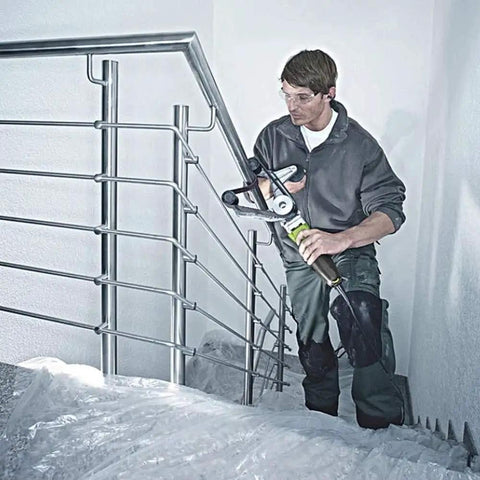 Man using Powerful 800W Electric Round Tube Polisher Sander Machine for stainless steel polishing on stair railing.