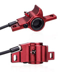 Upgrade Your Ride With This Premium Full Aluminum Alloy Hydraulic Disc Brake Kit Featuring Front And Rear Calipers Plus Brake Levers Easy Tool Free Pad Swap Universal Fit Smooth Stopping Power For Gnarly Trails - close-up of red hydraulic brake caliper with oil port.