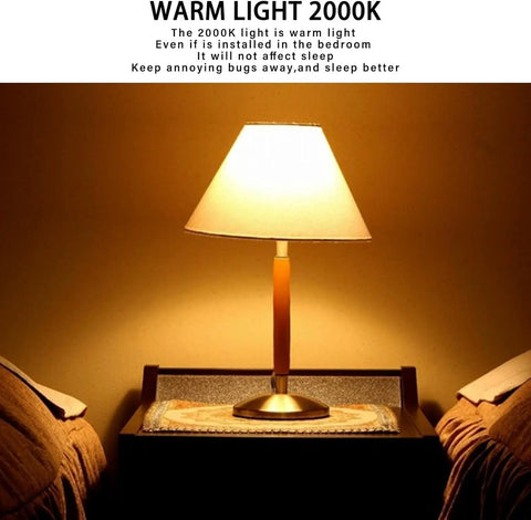 Bedside lamp with 2000K warm light glow in a bedroom setting, showcasing Amber Dusk To Dawn Outdoor Bug Light Bulbs 2 Pack Auto On Off.