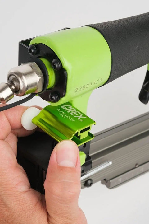 Close-up of Top Tier 23 Gauge Headless Pin Nailer With Auto Lock Out and Adjustable Edge Guide, highlighting its user-friendly design.