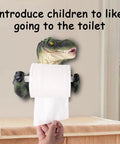 Dino Themed Toilet Paper Holder Adhesive Wall Mount in use, showing resin dinosaur design holding a roll, ideal for kid friendly bathroom decor.