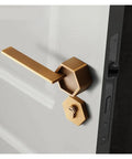 Top Shelf Interior Silent Door Lock Crafted From Premium Zinc Alloy Handle shown on door with smooth finish and hexagonal design.