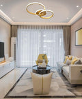 Modern LED Ceiling Light Flush Mount 106W With Six Ring Circle Design, Gold Acrylic Chandelier in elegant living room.