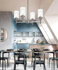 Four Light Modern Chandelier With Slick Brushed Nickel Finish Pendant Lighting With Clear Glass Shades in modern dining room