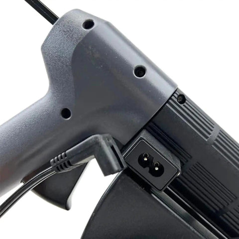 Close-up of a black and grey Dual Temp Corded PUR Hot Melt Glue Gun For 50 Gram Cartridges With 500W Heater Digital Temperature Readout.