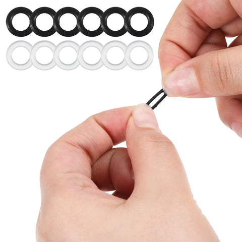 Hands holding silicone anti-slip ring from Glasses Tightening Kit With 100 Silicone Anti Slip Rings 4mm To Stop Slipping