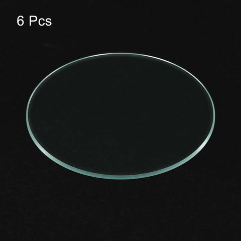 Six Pack Watch Crystal Lenses 32.5mm Diameter Round Flat Mineral Glass Replacement Parts for watch repair on black background.