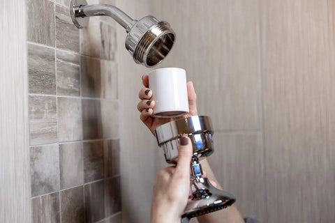 Installing High Output Shower Filter Cartridge for Sensitive Skin and Dry Scalp removes chlorine and impurities.