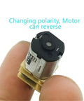 Close-up of N20 Micro Gearbox Motor Sleek DC Electric Drive Unit with detailed view of the reversing polarity feature.