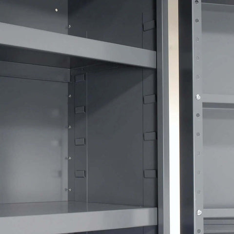 Interior view of deep door bin cabinet with 68 red plastic bins padlockable steel cabinet for tool and parts storage