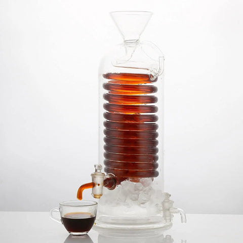 Next Level Glass Cold Brew Coffee Tower Featuring An Adjustable Speed Dripper And Clever Spiral Cooling Tube For Killer Iced Coffee Or Tea Effortlessly with dark coffee and ice