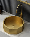 Totally Durable Gold Geometric Table Mounted Vanity Sink Built From Rugged 304 Stainless Steel Single Bowl Bathroom Basin With Quick Drain No Mess Cleanup For Serious Home Upgrade Vibes on marble countertop.
