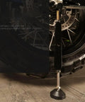 Close-up of a motorcycle wheel on a Motorcycle Wheel Lift Stand For Front And Rear Wheels Portable Trail Stand Beefy Heavy Duty Bike Lifting Jack With Adjustable Height Ideal For Chain Cleaning And Maintenance Rust Resistant Steel