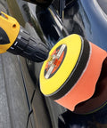 131Pcs 3 Inch Sanding Disc Drill Polishing Kit With Attachments for car detailing using rotary tool on black surface