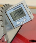 AngleCube Digital Level Bevel Gauge 2 In 1 for table saws setup on metal blade showing 30.00 angle with LCD display