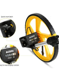 Close-up of QERTYHKK Foldable Measuring Wheel Distance Measurement Tools Meter/Feet showing display counter and reset latch.