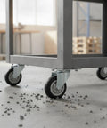 Heavy Duty Swivel Plate Caster Replacements Crafted From Solid Steel, Tough As Nails Casters on a cart rolling over cracked pavement.