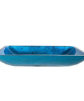 Side view of Irruption Blue Rectangular Glass Vessel Sink For Bathroom with Satin Nickel Drain, sleek modern design.