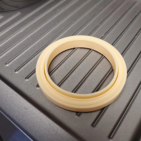 54mm Silicone Espresso Group Head Seal 2 Pack for Sage Espresso Machines on a metal surface