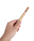 Person holding a marker from the Five Color Furniture Touch Up Markers Set For Wood Floors Cabinets Tables Desks And Doors, Scratch Repair Kit