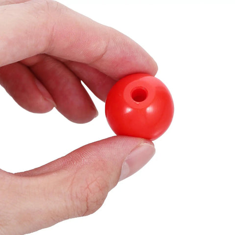 Hand holding red atom ball from Molecular Modeling Kit For Chemistry Students With 63 Atom Balls And 86 Bond Pieces