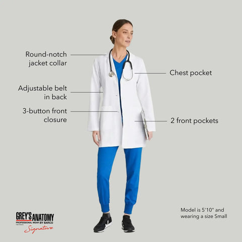 Woman wearing a white lab coat with 3-button front closure, chest pocket, and two front pockets, suitable for medical professionals.