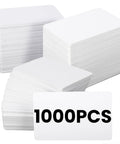 Top Shelf 1000 Pack Blank CR80 PVC ID Cards, Thick 30 Mil White Plastic Credit Card Size Swipes, stacked in various piles.