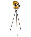 Lit Modern Tripod Floor Lamp in black finish with gold foil circular shade and leather accented legs, 58 inch tall.