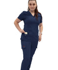 Women's V Neck Scrub Top Delivering Killer Comfort And Sharp Navy Styling crafted for nurses wearing navy scrubs with pockets.