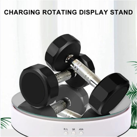 Smooth Rotating Display Stand With Electric Turntable For Jewelry Watches Phones And Bags with dumbbells on a mirror surface.