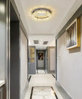 Crystal Chandelier LED Ceiling Light 16 Inch Flush Mount in modern hallway, warm glow from K9 crystals, circular sleek glam fixture