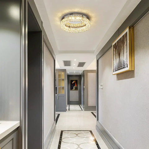 Crystal Chandelier LED Ceiling Light 16 Inch Flush Mount in modern hallway, warm glow from K9 crystals, circular sleek glam fixture