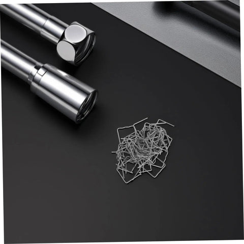 Hot Staple Repair Rods 100pcs For Automotive Bumper Repair Pre Cut Wave Staples and metal tools on black surface