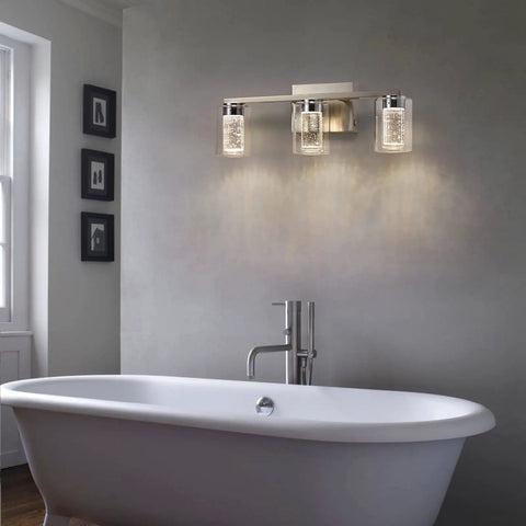 Three Light Brushed Nickel Vanity Light Fixture With Crystal Glass Shades Dimmable LED Bath Vanity Sconce in a bathroom