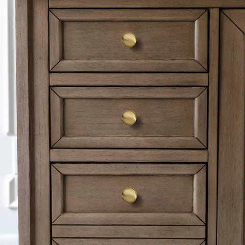 One And One Quarter Inch Champagne Bronze Zinc Alloy Cabinet Knob Single Hole Center Mount on wood dresser drawers