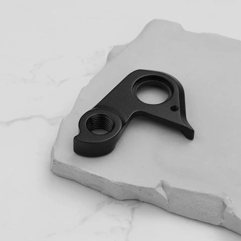 Derailleur Hanger 301092 For BMC Teammachine SLR01 SLR02 SLR03 Disc 2018 2021, black CNC-cut replacement on white surface