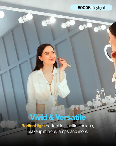 Woman applying makeup under G25 LED Globe Light Bulb 10 Pack Dimmable E26 Base 6W 450 Lumen 5000K Daylight Vanity Mirror Bath Lighting UL Listed Decorative Round Bulb for Energy Saving.