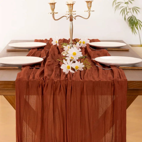 Rustic Terracotta Table Runner Hand Dyed From Breathable Cheesecloth on a table, 35"W x 120"L, perfect for wedding or Thanksgiving.